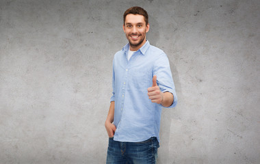 smiling man showing thumbs up