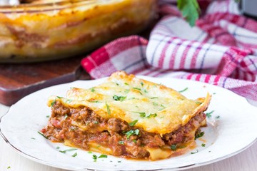 Homemade lasagna with Bolognese meat sauce Bechamel, serving