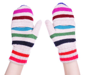 Female hands in mittens isolated on white