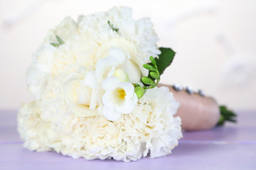 Beautiful wedding bouquet on light background