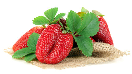 Strawberries with leaves isolated on white