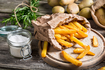 Homemade fries with salt and herbs