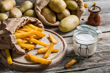 Homemade fries with salt and pepper