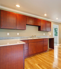 New cherry wood cabinet kitchen.