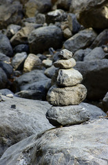 Fototapeta na wymiar Memorial mound of stones in the mountains
