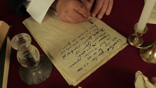 Chronicler writes in the candlelight
