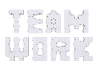 3d teamwork text assembled of puzzles