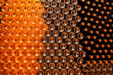 Stack of wine bottles.