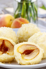 Apricot in pastry, popular austrian dish. Garden party table