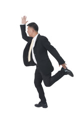 businessman jumping isolated on white background