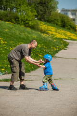 Fototapeta premium Rollerblades / inline skates teaching time