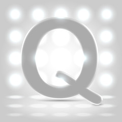 Q over lighted background