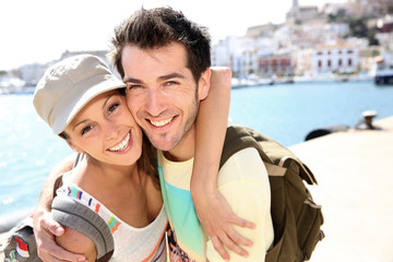 Obraz premium Cheerful couple of tourists visiting Ibiza
