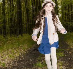 portrait of a girl in the spring forest