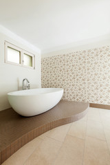 Fototapeta na wymiar Interior of a new empty house, bathroom, view bathtub
