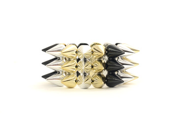 Close up on a black silver bracelet with spikes