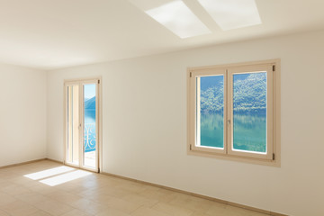 Interior of a new empty house, windows view