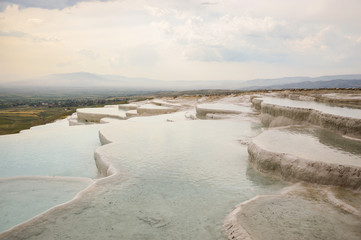 Travertine terraces filled with water © anzebizjan