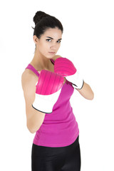 Pretty young woman with boxing gloves