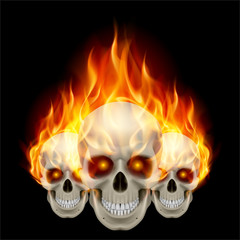 Three flaming skulls