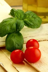 tomatoes and basil on a broken wooden box