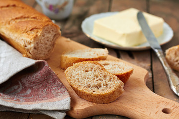 Sliced baguette with butter