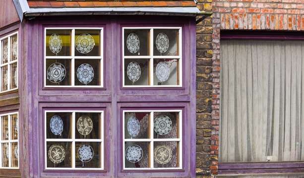 lacemakers window display, Bruges, Belgium
