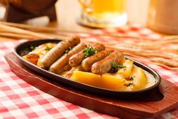 roasted potatoes with sausage in the bar