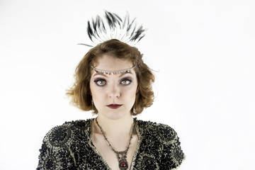 Beautiful young woman dressed as flapper in sequin dress