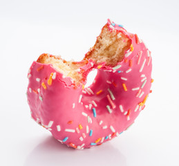 glazed donuts with colored sugar granules