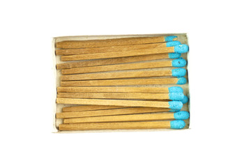 Blue matchstick in old box isolated