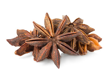 Anise stars on a white background