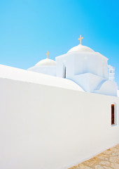 2 Beautiful old white twin churches in  Amorgos island in Greece