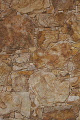 Alte Lehm Naturstein Mauer Mosaik in Italien Hauswand Garten Mauer aus Stein Hintergrund.