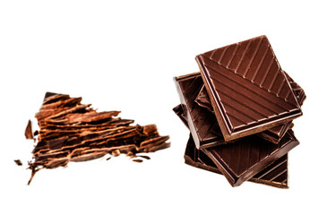 Broken milk chocolate bar isolated on white background closeup.