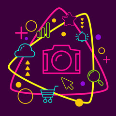 Photo camera on abstract colorful geometric dark background with