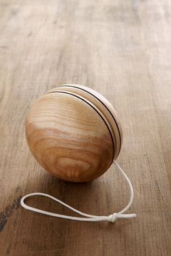 Wooden Yo yo and old fashioned childhood concept