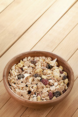 Delicious and healthy cereal in bowl with milk