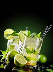 Mojito drinks on black background