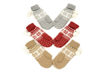 Winter mittens nicely arranged.Gloves with snowflakes isolared.