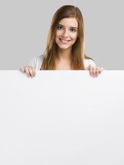 Fototapeta premium Woman with a big blank board