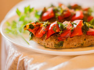 Meat dish with vegetables on a plate
