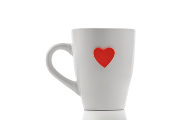 Cup with red heart isolated on white
