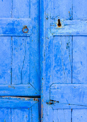 Detail of a blue wooden door in Amorgos island in Greece