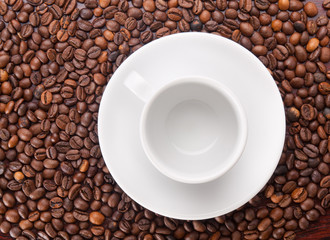 A white cup on beans background
