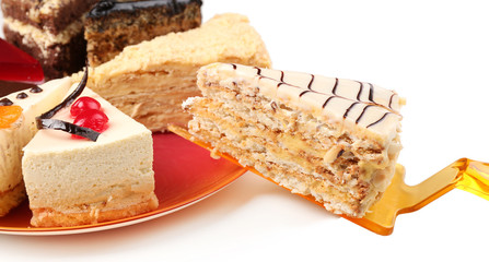 Assortment of pieces of cake, isolated on white © Africa Studio