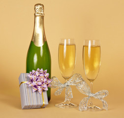 Bottle of champagne and wine glasses