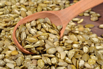Cleared pumpkin seeds in a spoon