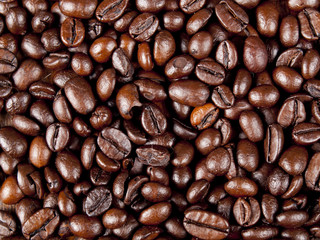 Background of freshly dark roasted coffee beans