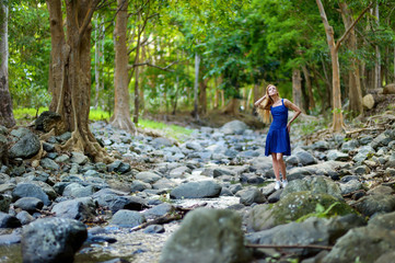 Young beautiful woman on a tropical island